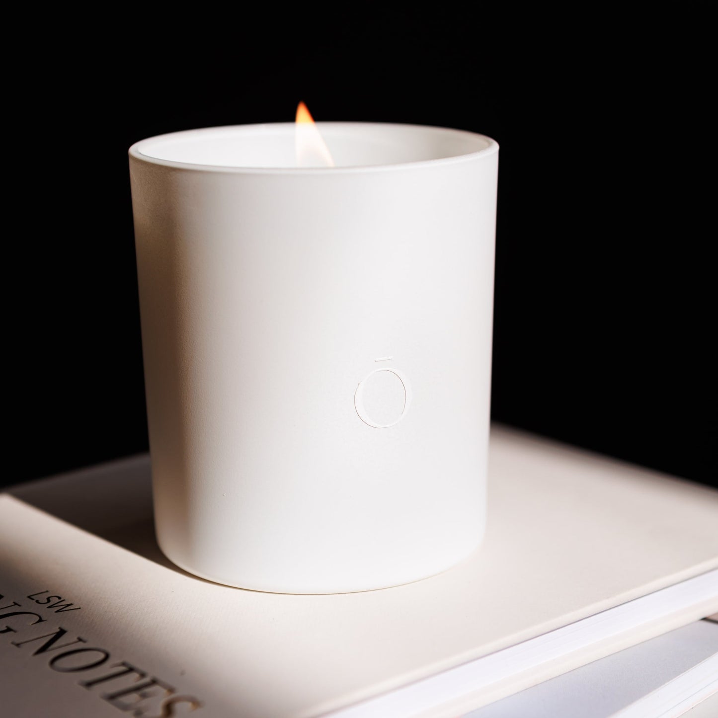 Shō-moon Meditation Candle Resting on a Mindfulness Journal